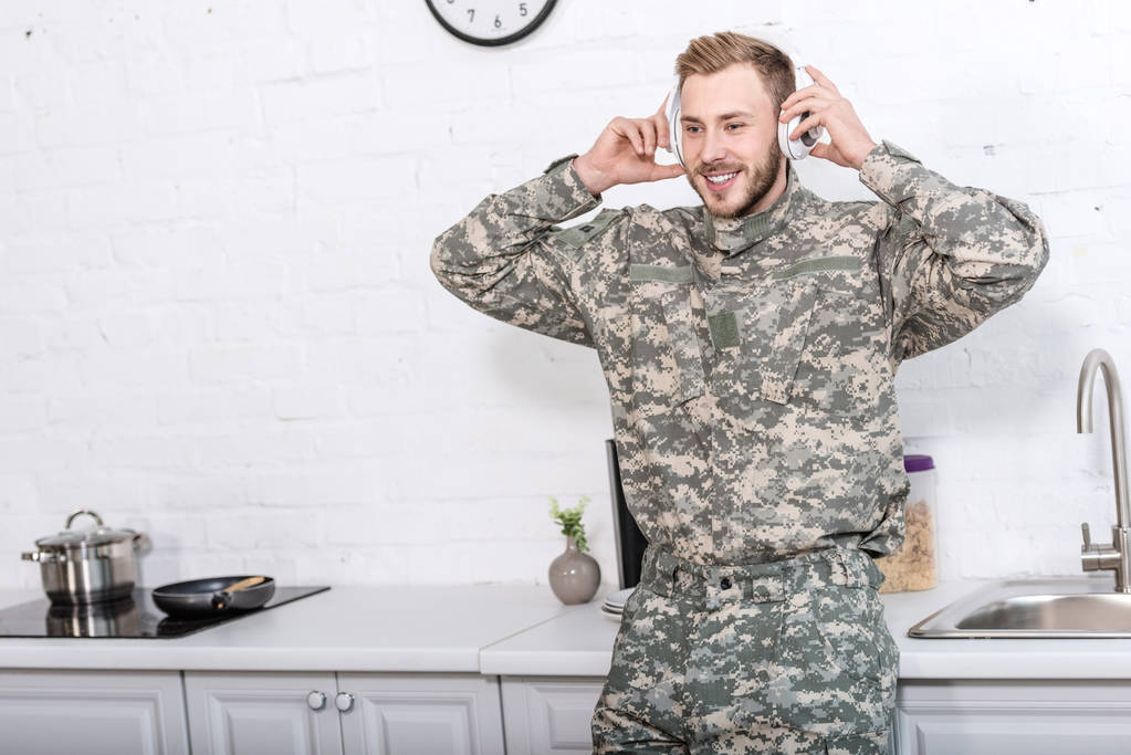 stock photo handsome soldier military uniform wearing 1